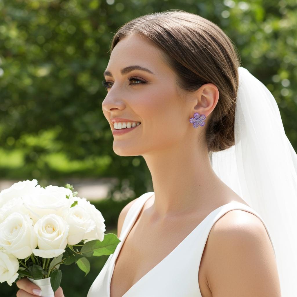 Bride holding a bouquet of white flowers with a blurred green background