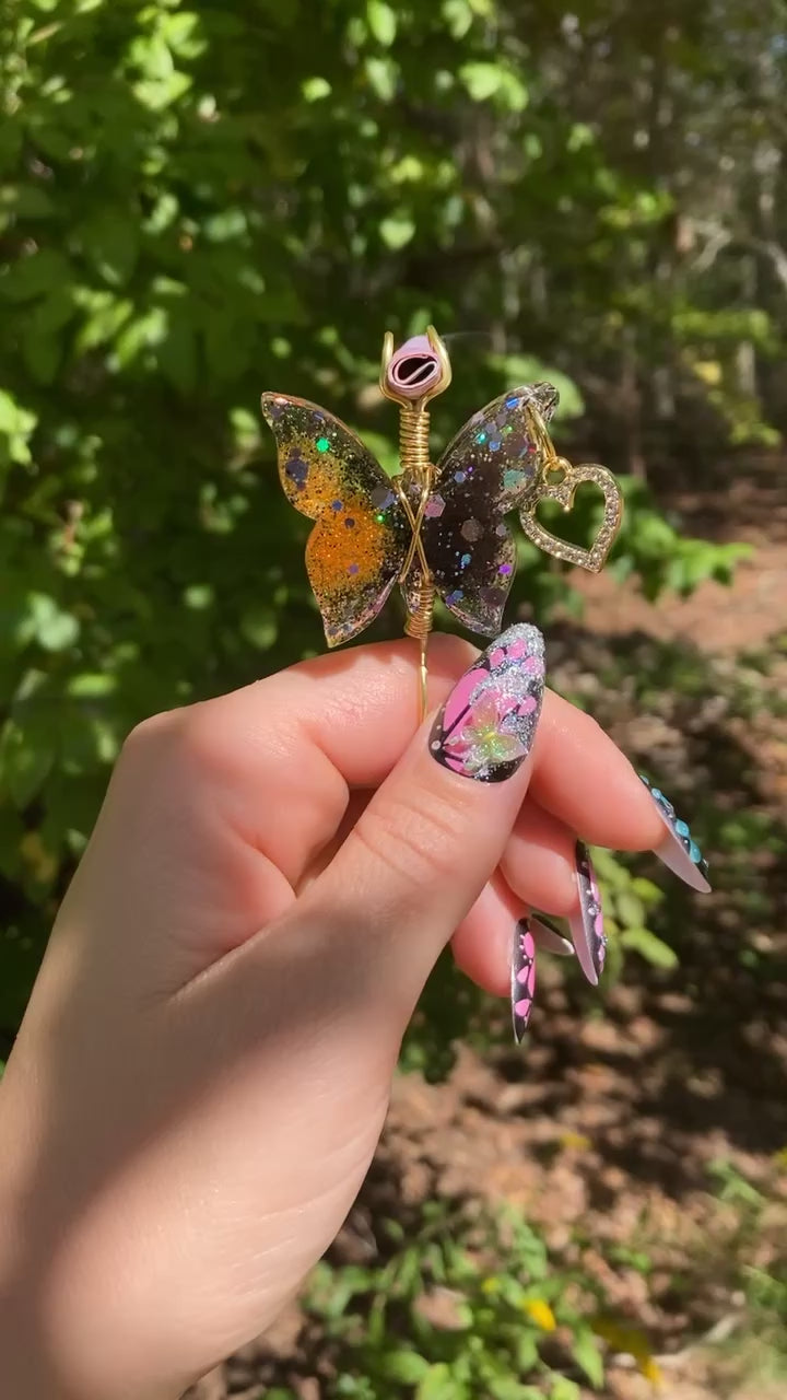This video shows a butterfly smoke ring with a faux joint in a nature setting.