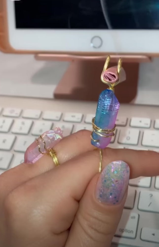 Video shows a quartz crystal smoke ring lit with a faux joint in front of a computer.